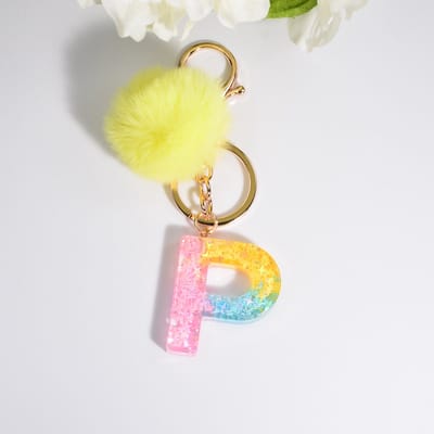 Sleutelhangers of voor je tas van A tot Z - met een pompon of kwastje - met letter - mooi design - handgemaakt - sleutelhangers - design - mode - goud - zwart - blauw - roze- rood