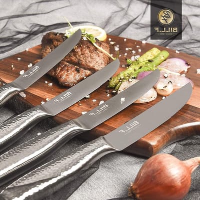 Steakmessenset 4-delig, 4,5 inch met golfsnede en roestvrijstalen handvat voor perfect snijden van vlees