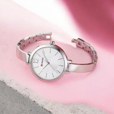 CURREN Wit Wijzerplaat Zilverkleurige Elegant Dameshorloge - Minimalistisch RVS Horloge met Japanse Quartz in 5 Kleuren - 36mm Kast