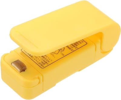 Draagbare mini-sealmachine, handbediende vacuümsealmachine voor levensmiddelen, mini-sealmachine met magneetsluiting, geschikt voor het bewaren van snacks in plastic zakjes, geel