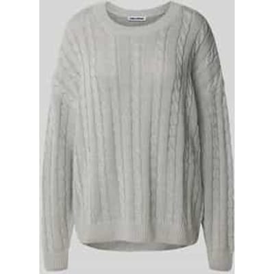 Gebreide pullover met kabelpatroon en ronde hals