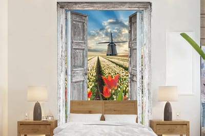 Behang - Fotobehang Bloemen - Molen - Lente - Doorkijk - Breedte 155 cm x hoogte 240 cm