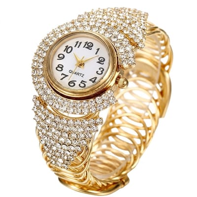 Goudkleurig analoog horloge dames – rond uurwerk met glanzende kristal accenten – elastische polsband met diamantlook details – quartz horloge