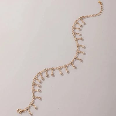 Aramat Jewels | Enkelbandjes | Goudkleurig Enkelbandje met Zirkonia Steentjes | Transparant | |3mm | Metaal | Volwassenen | Verkleurd niet