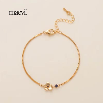 Maevi® Armband - Geboortebloem & Geboortesteen - Maand: Februari - Kleur: Goud - Hoge Kwaliteit - Luxe Armband - Kraamcadeau / Geboorte Cadeau / Verjaardag Cadeau - RVS / Roestvrijstaal - Verkleurt Niet - Armband / Bracelet - Incl. Kado Verpakking