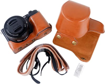 Hoogwaardige PU Leren Case voor Sony ZV-E10 Spiegelreflexcamera - Beschermende Grip Cover met Strap in Bruin, Perfect voor Fotografie en Reizen