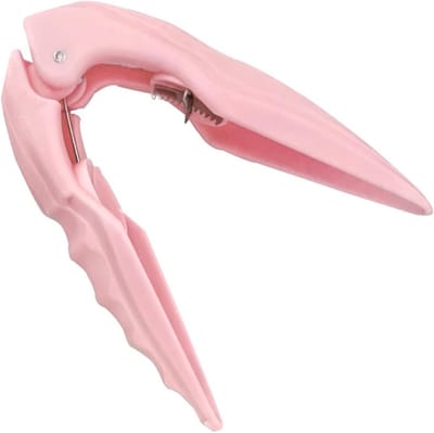 Premium roestbestendige kastanjekraker van staal met antisliphandvat — ideaal voor het kraken van noten en voor stijlvolle keukenopslag. Kleur: Roze.