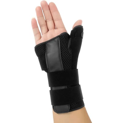 1 attelle de poignet à compression ajustable pour pouce et main, avec support fixe et protection pour l'articulation du poignet, du pouce et de la main.