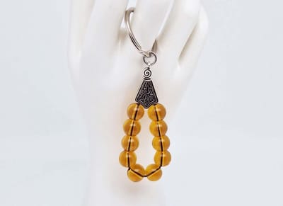 Handgemaakte druppel sleutelhanger van natuursteen " Citrine" en metaal - diameter kralen 10mm - Aantal stenen10- Een mooi cadeau-idee en een bijzonder aandenken