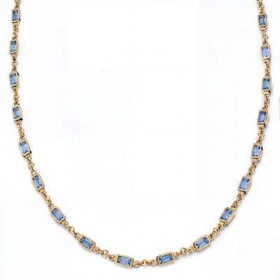 Prism | Goudkleurige ketting met donkerblauwe stenen van kristalglas