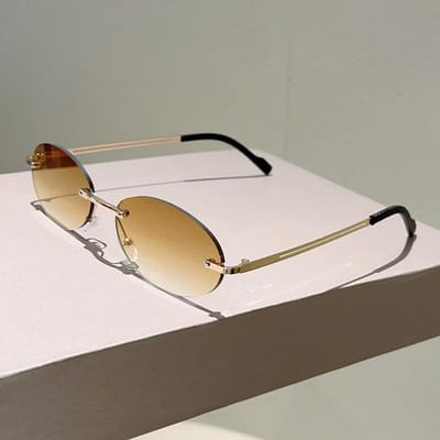 Randloze Ovalen Zonnebril Dames Stijlvolle Verloop Decoratie Glazen Oogbescherming Nieuwste Stijlvol Tijdloos Ontwerp Casual Bril 1PC