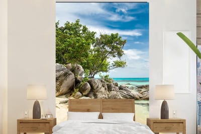 Behang - Fotobehang Strand - Stenen - Zee - Zomer - Breedte 195 cm x hoogte 300 cm