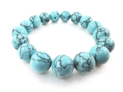 Armband - Edelsteen - Turquoise blauw - 10 mm Kralen - 17 cm - beschermende werking en fysieke en emotionele pijn te verlichten..