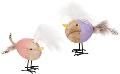 Decoratieve houten vogel met veren en een kleurrijk lijfje voor tafeld