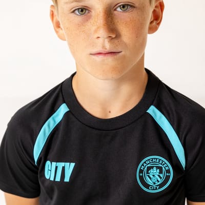 Manchester City Voetbaltenue Kind - Officiële Fanmerchandise - Shirt + Broekje - Zwart/Lichtblauw - Maat 116 t/m 164