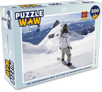 Puzzel Een snowboarder kijkt uit over de besneeuwde bergen - Legpuzzel - Puzzel 500 stukjes