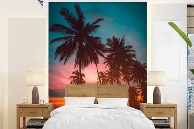 Behang - Fotobehang Zee - Palmboom - Zonsondergang - Strand - Silhouette - Breedte 190 cm x hoogte 260 cm