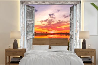 Behang - Fotobehang Landschap - Zonsondergang - Water - Doorkijk - Breedte 300 cm x hoogte 300 cm