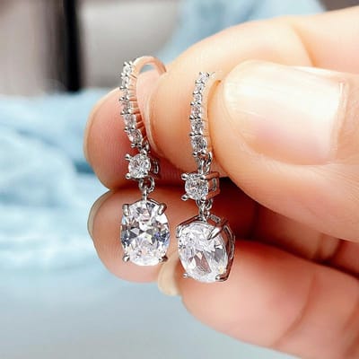 Huitan Sierlijke Hangende Oorbellen voor Vrouwen Wit/Geel/Roze Ovale CZ Hanger Dagelijks Dragen Delicate Accessoires Feest Mode Sieraden brown