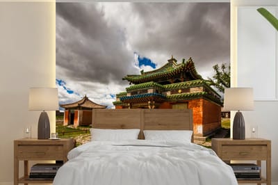 Behang - Fotobehang Deken van donkere wolken boven Erdene Zuu klooster - Breedte 240 cm x hoogte 240 cm