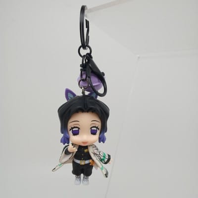 Porte-clés PVC Demon Slayer Figurine Anime Charme Accessoire Cosplay Cadeau pour Fans violet