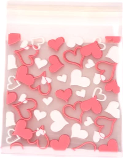 Scoby - 100x Uitdeelzakjes 7x7cm - Traktatiezakjes - Snoepzakjes - Roze/Witte Hartjes