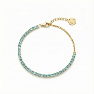 Petit Comité - Armband Dames Goudkleurig Tennis Bracelet - Geboortesteen Maart Aquamarijn - 925 Sterling Zilver - 18k Gold Plated
