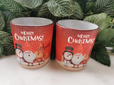 Set van 2 Geurkaarsen Merry Christmass met kerstfiguren Kaneel - 7cmx8cmH 22branduren