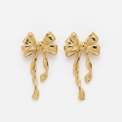 Goudkleurige oorbellen voor dames – oorstekers met strik design – elegante strik oorhangers