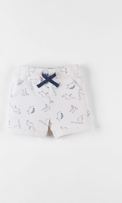 Noukie's - Jongens - Bermuda short - Vanille met blauwe dino print - 12 maand 80