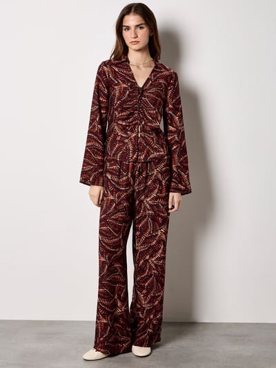 Broek met wijde pijpen en abstracte print