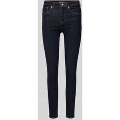 Skinny fit jeans met knoopsluiting