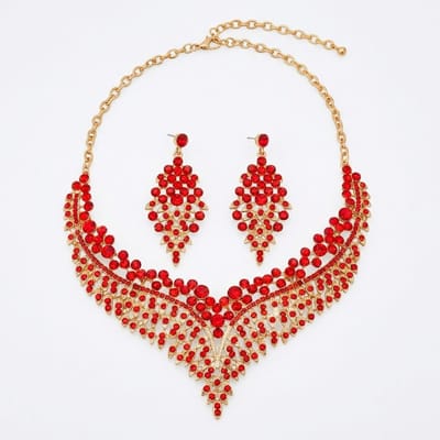 Goudkleurige statement ketting voor dames – sieradenset met oorbellen