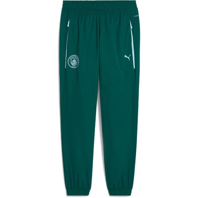 Manchester city fc mcfc pumatech woven pants in de kleur groen.