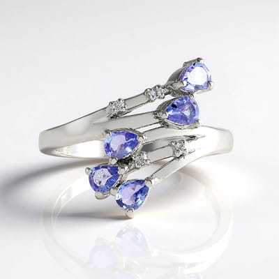 Cavill - Verstelbare Ring 925 Sterling Zilver Gerhodineerd - 0,63 ct Peervormige Tanzaniet & Witte Topaas - Elegant & Handgemaakt