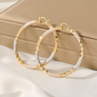 Boucles d'oreilles créoles en métal texturé one-size beige