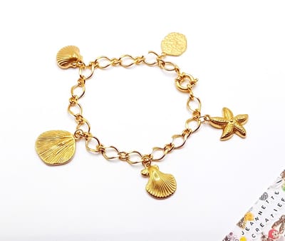 Jeannette-Creatief® - Beach - Bedelarmband Zeestar Starfish Schelpen Shell RVS Goud Jasseron Boeislot Ammoniet - Bedel Zeester - Bedel Schelp - Bedels - Strandsieraden - Zomerse Sieraden - Schelpen- Schelpenarmband – Mermaidcore