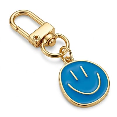 Goudkleurige smiley sleutelhanger metalen sleutelhanger dames en heren met blauw emaille smiley hanger en karabijnhaak, decoratieve keychain voor sleutels, tas en rugzak