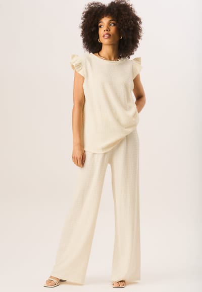 Oversized top met ruches en mouwen