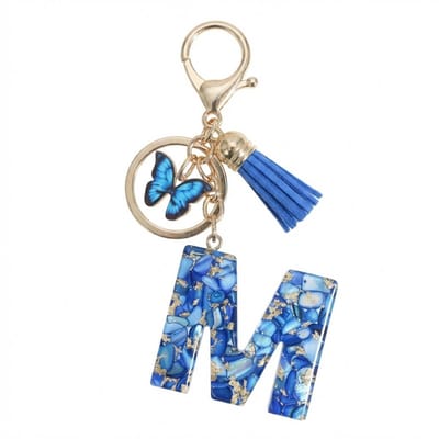 Blauwe letter M sleutelhanger met kwastje en vlinder – sleutelhanger voor dames – goudkleurige metalen keychain met acryl initiaal M hanger, decoratieve bedel en tassel