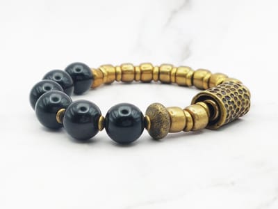 Mei's - Tibetan Copper Marbles - armband dames - koper goud/zwart - polsmaat 15,5 cm