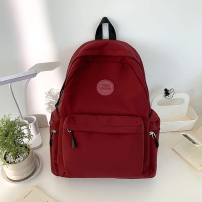 Veelzijdige rugzak in effen kleur voor reizen  Schooltas met grote capaciteit voor leerlingen van de onder- en bovenbouw  Casual rugzak .