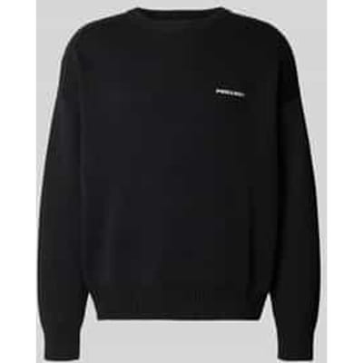 Oversized gebreide pullover met labelstitching