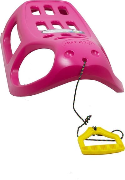 Kinderen winter rodelbaan roze