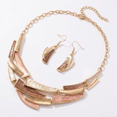 Goudkleurige statement ketting voor dames met bruin beige hanger en oorbellen set