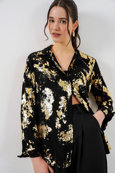 Oversized gestreepte blouse met knopen