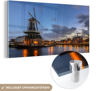 MuchoWow® Glasschilderij 40x20 cm - Schilderij acrylglas - Molen - Haarlem - Licht - Foto op glas - Schilderijen