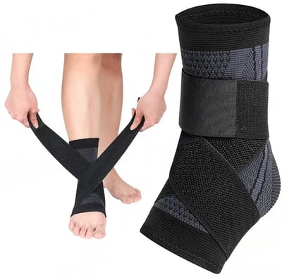 Jonyx - Enkelbrace - Voetbrace - Enkelband - Bandage - Ondersteuning - Compressie - Zwachtel - Bescherming - Met banden voor extra druk - Grijs/zwart - One size