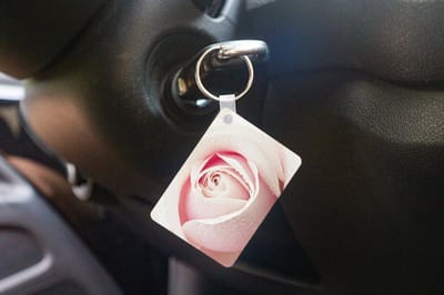 Sleutelhanger - Een mooie foto van de details van een roze roos - Uitdeelcadeautjes - Plastic