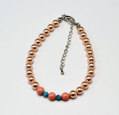 1 Parel Armbanden Made With Pearls From Swarovski peache en blauw maat 16,18,19,20 cm verstelbaar
